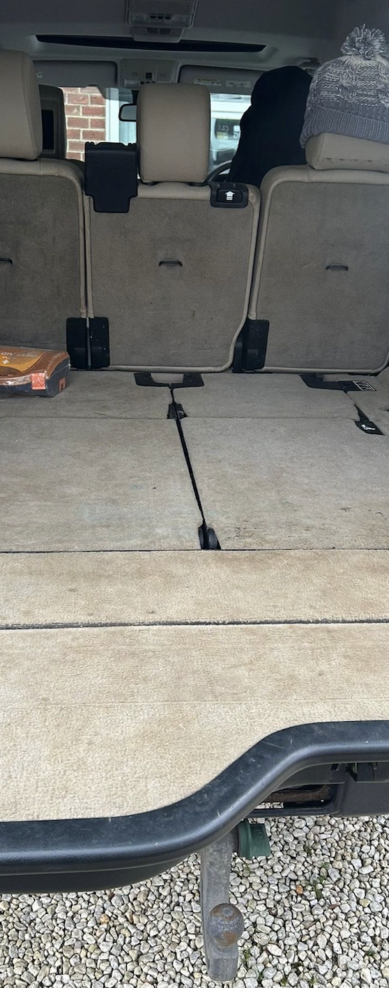 Dirty car carpet before professional cleaning