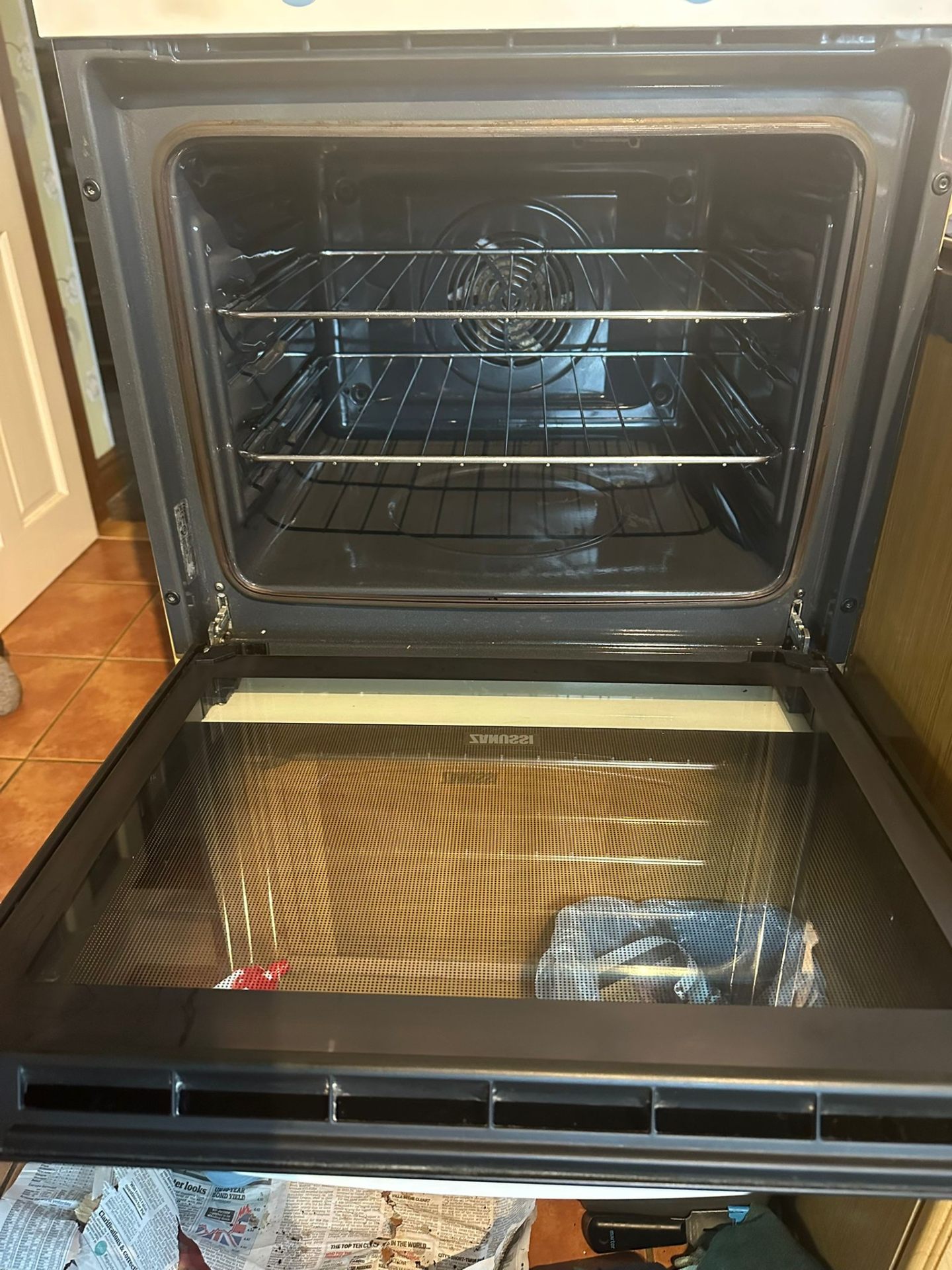 Oven after cleaning - sparkling clean door and interior