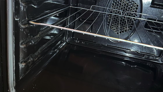 Oven interior after cleaning - gleaming clean surfaces