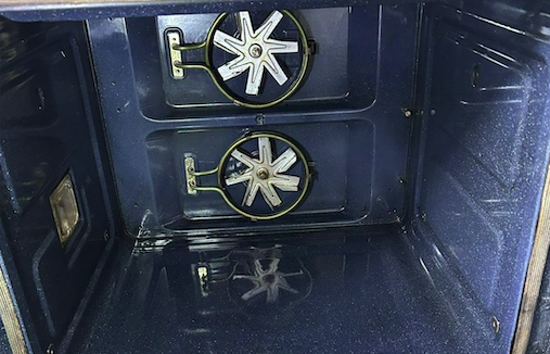 Oven fan covers after cleaning - spotless and gleaming