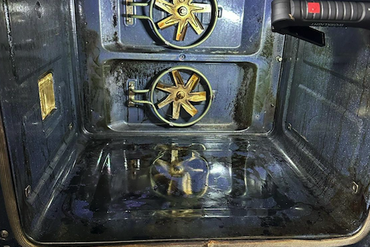 Oven fan covers before cleaning - heavy grease and carbon buildup