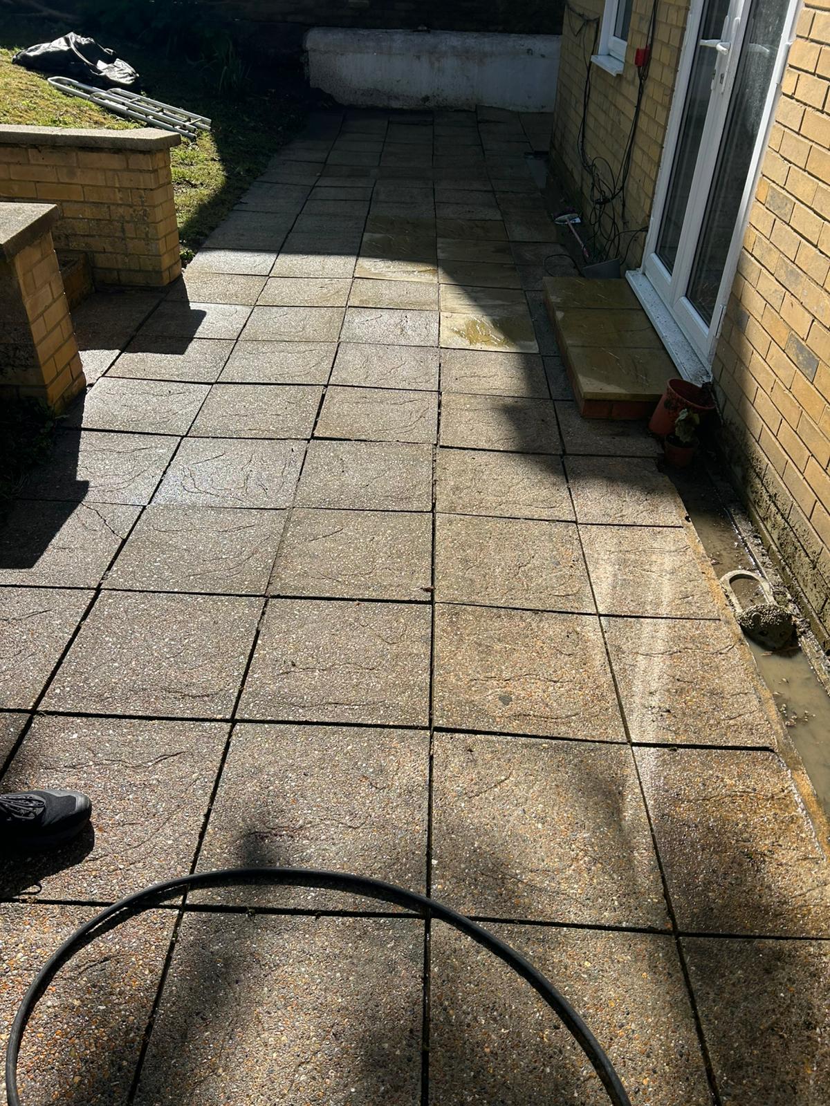 After - Clean patio area with restored surface