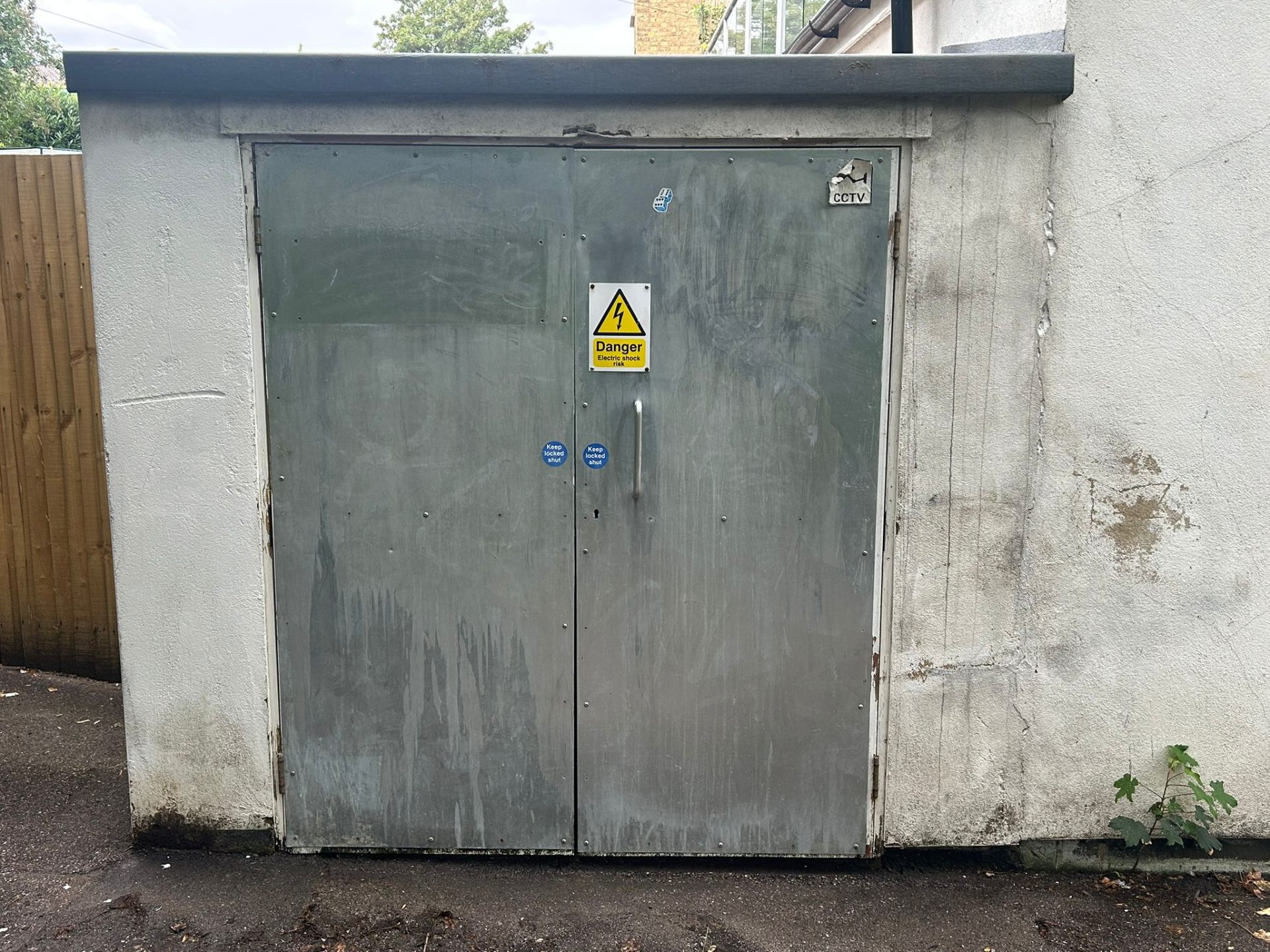 Before - Spray paint graffiti on building wall