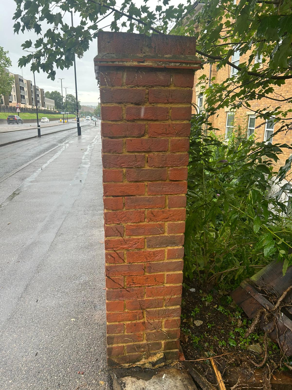 Before - Graffiti on brick pillar and wall