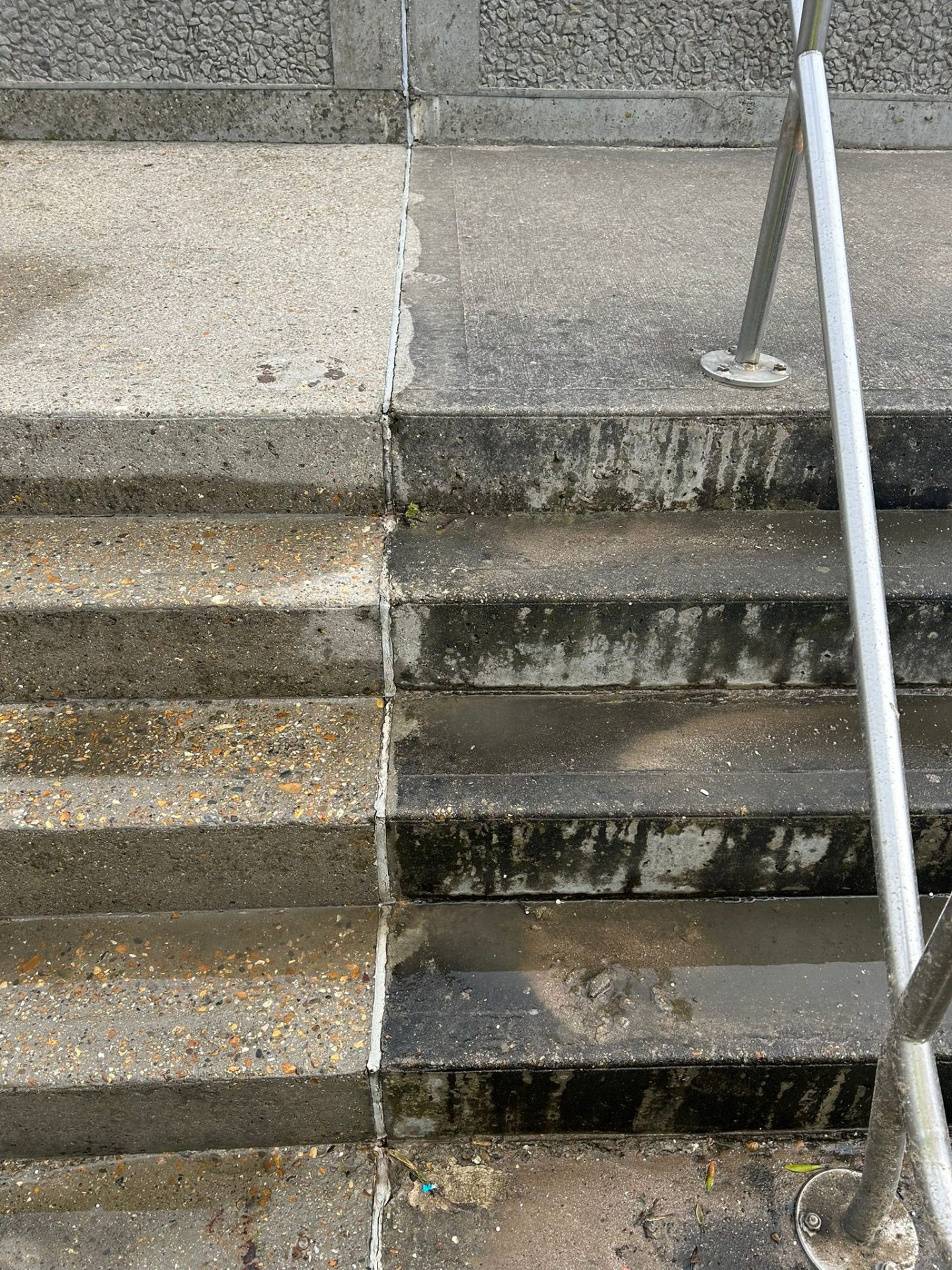 Dirty concrete steps requiring professional jet washing cleaning