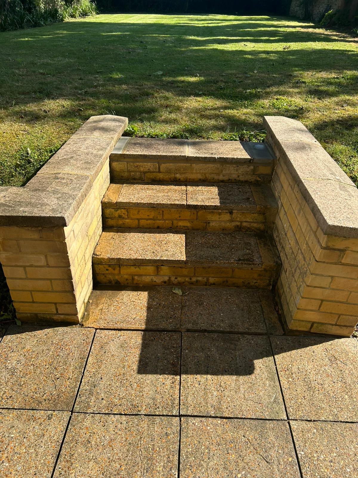 After - Clean restored stone steps and seating area