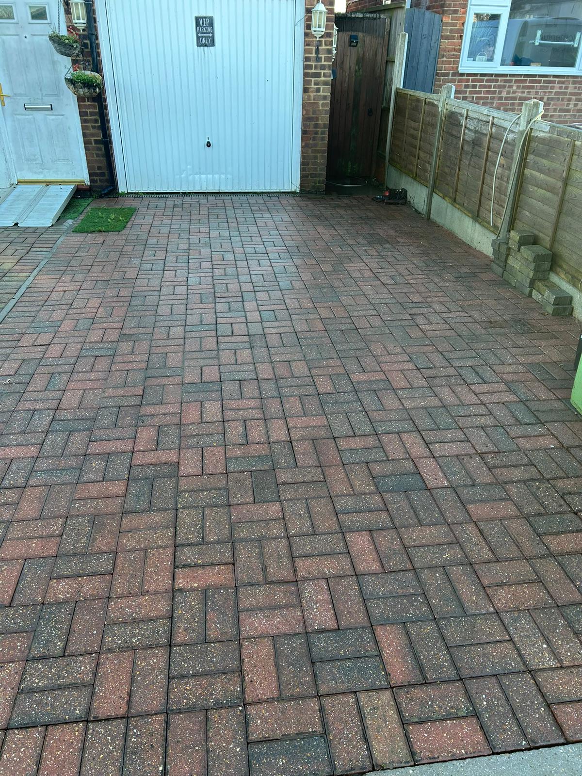 Block paving driveway before professional cleaning treatment